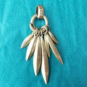 2/10$ Gold tone moving pendant